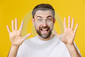 Hi, Hello. Portrait of happy friendly brown-haired man with small beard in white shirt waving hand to camera, welcoming