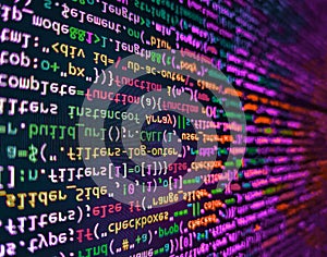 Hi-tech modern screen of data, digits and chars on monitor. Binary code digital technology background. Software engineer at work.