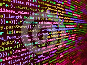 Hi-tech modern screen of data, digits and chars on monitor. Programming code abstract screen of software developer. Lines of Html