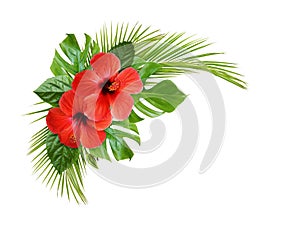 Hibiscus flower and palm leaves in corner tropical arrangement