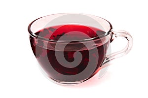 Hibiscus tea in a glass cup .