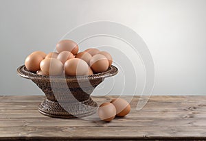 Hicken eggs in a wicker bowl