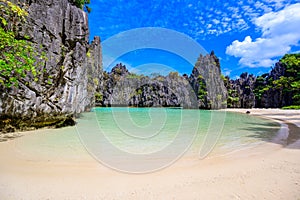 Hidden beach in Matinloc Island, El Nido, Palawan, Philippines - Paradise lagoon and beach in tropical scenery