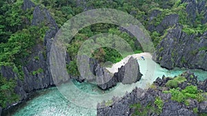Hidden Beach in Palawan, Sightseeing Place. Tour C in El Nido, Philippines. Secluded Locale with Towering Rock Formations,