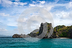 Hidden perfect beach close to Miniloc Island, El nido region of Palawan in the Philippines photo