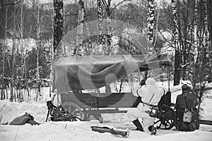 German Wehrmacht Infantry Soldier In World War II Soldiers Sitting In Ambush Near Peasant Cart In Winter Forest And