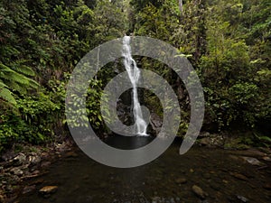 Hidden secret green tropical forest waterfall Wentworth Falls in Whangamata Coromandel Peninsula Waikato New Zealand