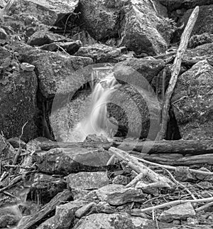 Hidden Waterfall in a Boulder Field