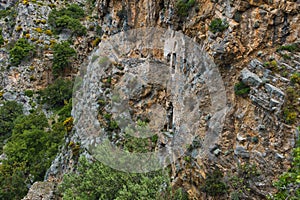 Hidder monastery high on a cliffs over mediteranean sea, Lycian way near Kayakoy village and Oludeniz beach, Fethiye