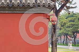 Hide Security camera on the red wall