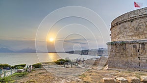 Hidirlik tower in Kas town in Antalya timelapse with view of harbor marine bay is a old city photo