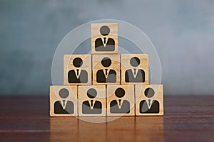 Hierarchical structure, organization and leadership concept. photo