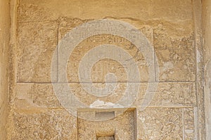 hieroglyph on the wall of the temple near Giza pyramids in Giza