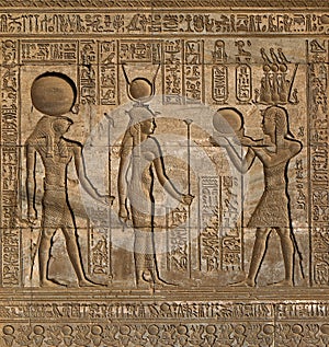 Hieroglyphic carvings in ancient egyptian temple