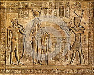 Hieroglyphic carvings in ancient egyptian temple