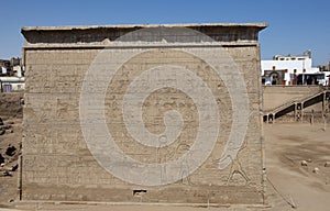 Hieroglyphic carvings on an ancient egyptian temple wall