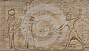 Hieroglyphic carvings on an ancient egyptian temple wall