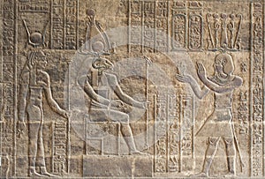 Hieroglyphic carvings on an Egyptian temple wall