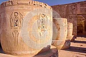 Hieroglyphs and columns at Medinet Habu temple in Luxor