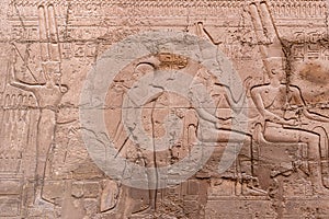 Hieroglyphs in Ruins of the Karnak Temple Complext at Luxor representing the ancient Egyptian god Min