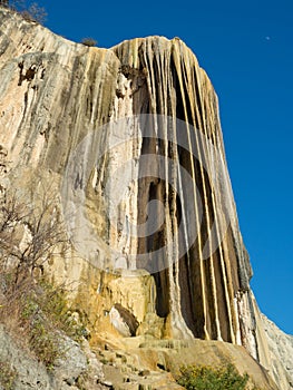 Hierve el agua, natural wonder formation in Oaxaca region in Mexico, hot spring waterfall in the mountains during sunset