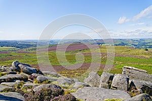 From Higger Tor, across Hathersage Moor to a distant hazy Suprise View photo
