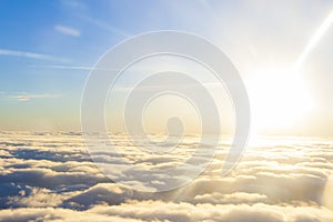 high above the sun and clouds. photo