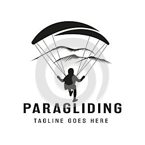 High Adventure Vintage logo design inspiration silhouette Paragliding landing. Paragliding logo design