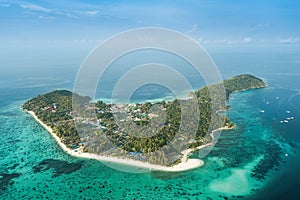 High aerial overview of entire tropical Lipe Island and Andaman