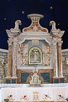 High altar in the Shrine of Our Lady of Carsko polje in Cara, Croatia photo