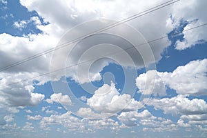 High altitude blue sky and white clouds background in sunny weather
