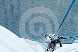 High-altitude climber. The profession of working at height