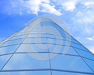 High-altitude glass buildings with the sky
