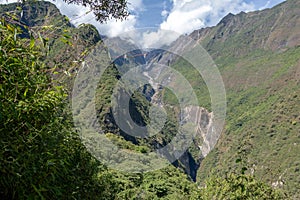 High-altitude jungle lush flora in green Rio Bianco Valley after Choquequirao pass, Andes, Peru photo