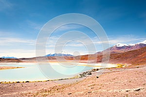 High-altitude lagoon and volcanoes on Altiplano plateau, Bolivia