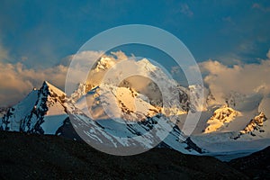 High altitude mountain range snow-capped glacier peak