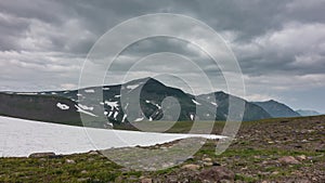 In a high-altitude valley there is melted snow.