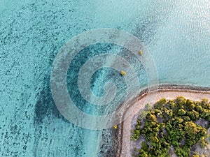 High angle aerial bird\'s eye drone view of a small beach section of Haman Island