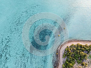 High angle aerial bird\'s eye drone view of a small beach section of Haman Island