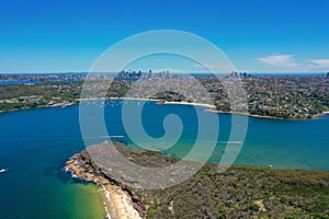 High angle aerial drone view of Balmoral Beach and Edwards Beach in the suburb of Mosman, Sydney, New South Wales, Australia. CBD