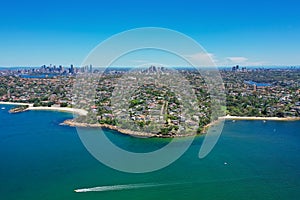 High angle aerial drone view of Edwards Beach and Chinamans Beach in the suburb of Mosman, Sydney, New South Wales, Australia. CBD