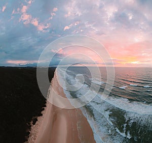 High angle aerial drone view of famous Seventy Five Mile Beach, 75 mile beach on Fraser Island, Kgari, Queensland