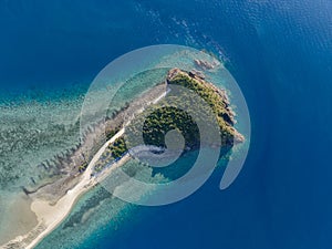 High angle aerial drone view of Langford Island, a small islet next to Hayman Island