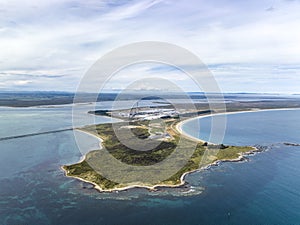 High angle aerial drone view of Tiwai Point. New Zealand. It is known for a large industrial aluminium smelter.