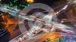 High-angle of cars at crossroads at night, time-lapse, city overpass in China