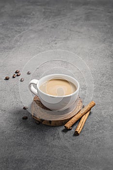 high angle coffee cup with cinnamon sticks copy space. High quality photo