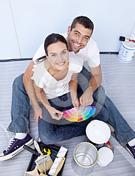 High angle of couple chosing colours photo