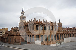 High-angle of Fabrica Casaramona with cloudy, gloomy sky background photo