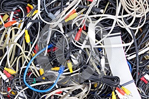 Close-up of different tangled cables and wires