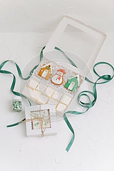 High angle image of christmas cookies and white turkish delight in an open box